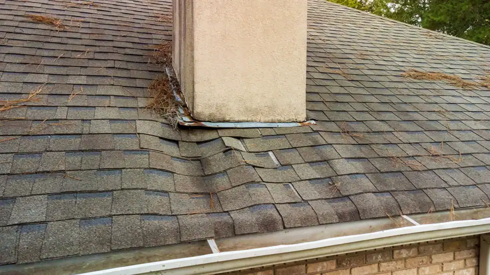 Skilled worker repairing damaged roof chimney flashings in Talbot County, MD, ensuring secure and weatherproof protection for residential property with Bay Area Exteriors