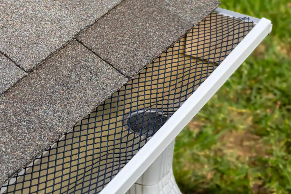 Gutter guard installation on a residential home in Talbot County, MD by Bay Area Exteriors, protecting gutters from leaves and debris for improved drainage